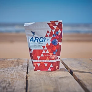 complément Argi+ Forever sur table en bois en extérieur soutien circulation sanguine et énergie